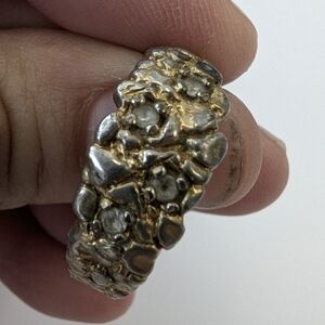 VRG BRASS RING W/CUBIC ZERC, QUARTZ OR DIAMONDS??? NOT SURE